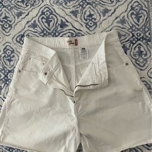 White Levi’s jean shorts, size 14.